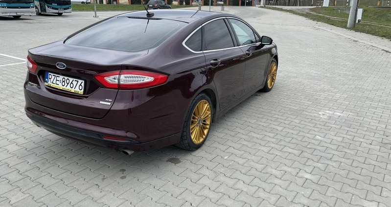 Ford Fusion cena 33500 przebieg: 229840, rok produkcji 2013 z Koluszki małe 326